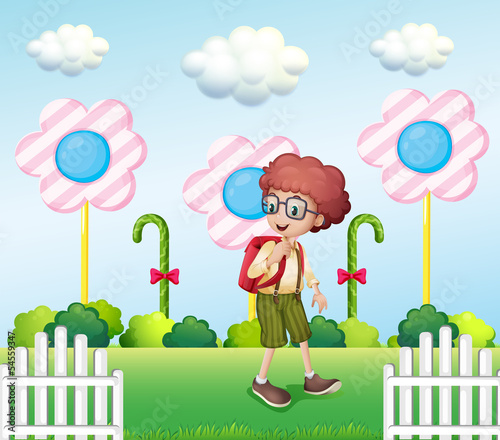 A student in the garden with candies