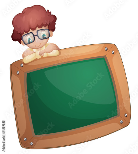 A young man at the back of the greenboard