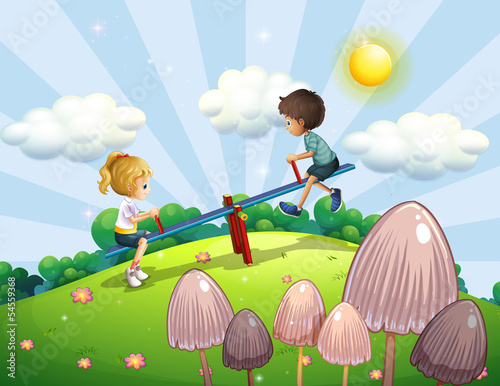 A boy and a girl riding a seesaw