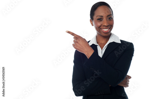 Lady pointing towards copy space area