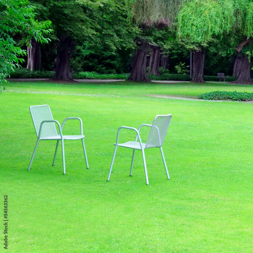 Lounge chairs for relaxing in the summer park Lounge chairs for relaxing in the summer park