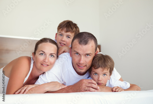 Portrait of happy family in home