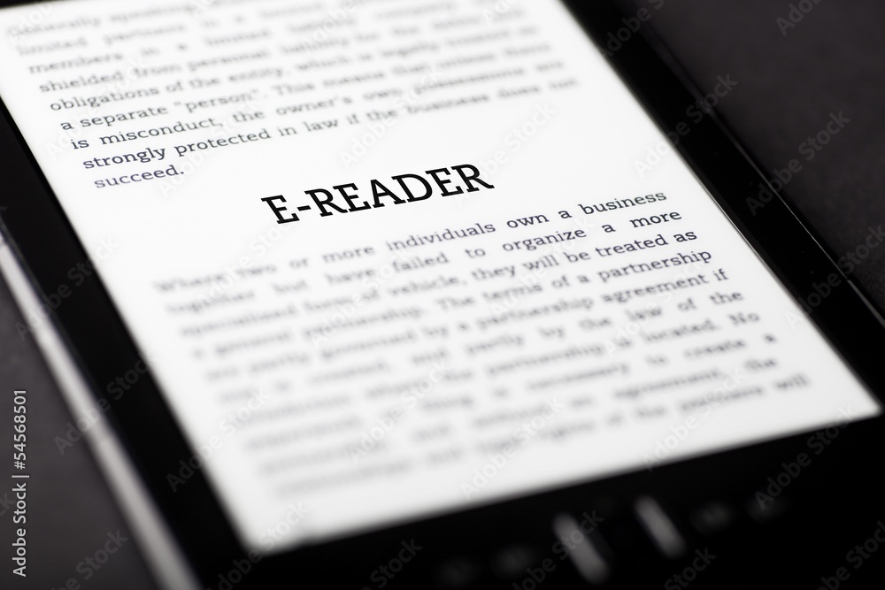 E-reader on tablet touchpad, ebook concept E-reader on tablet touchpad, ebook concept