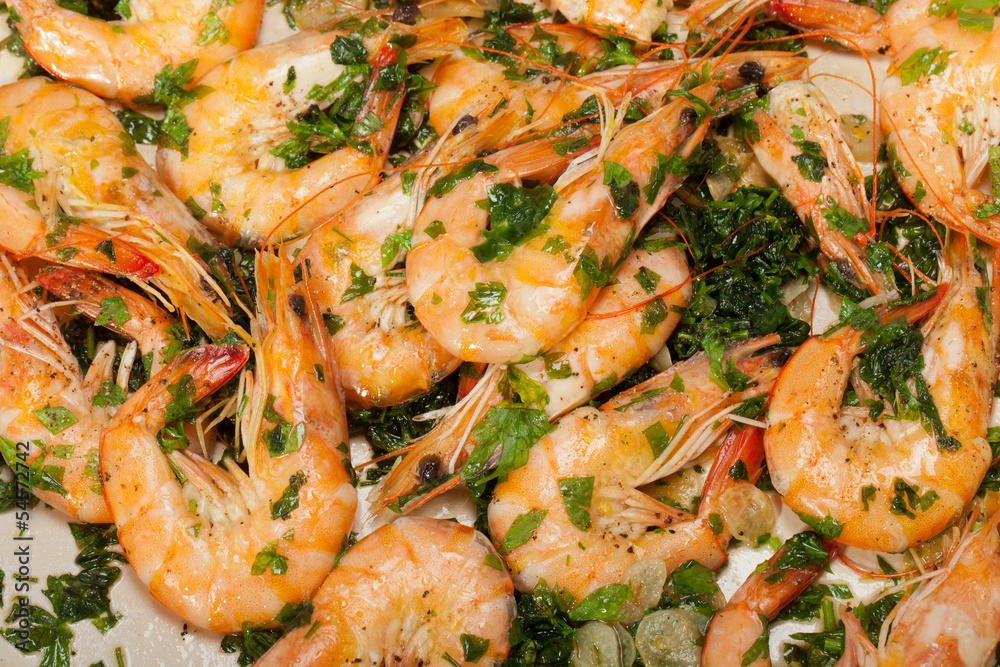 Fried shrimps with the garlic and the parsley Fried shrimps with the garlic and the parsley