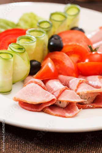 Meat appetizer with vegetables