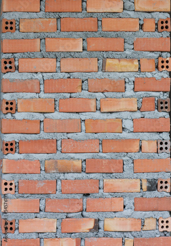 brown bricks and concrete wall