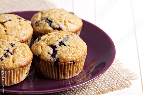 Healthy blueberry banana muffins on a plate