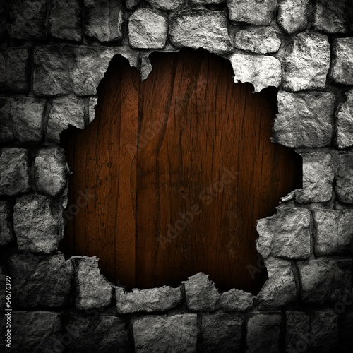 wood board in broken stone wall