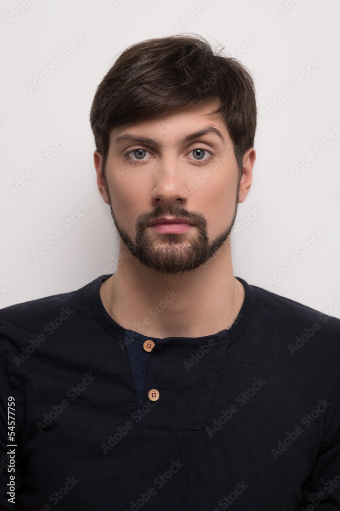 Man with raised eyebrow. Portrait of a handsome man with raising Man with raised eyebrow. Portrait of a handsome man with raising