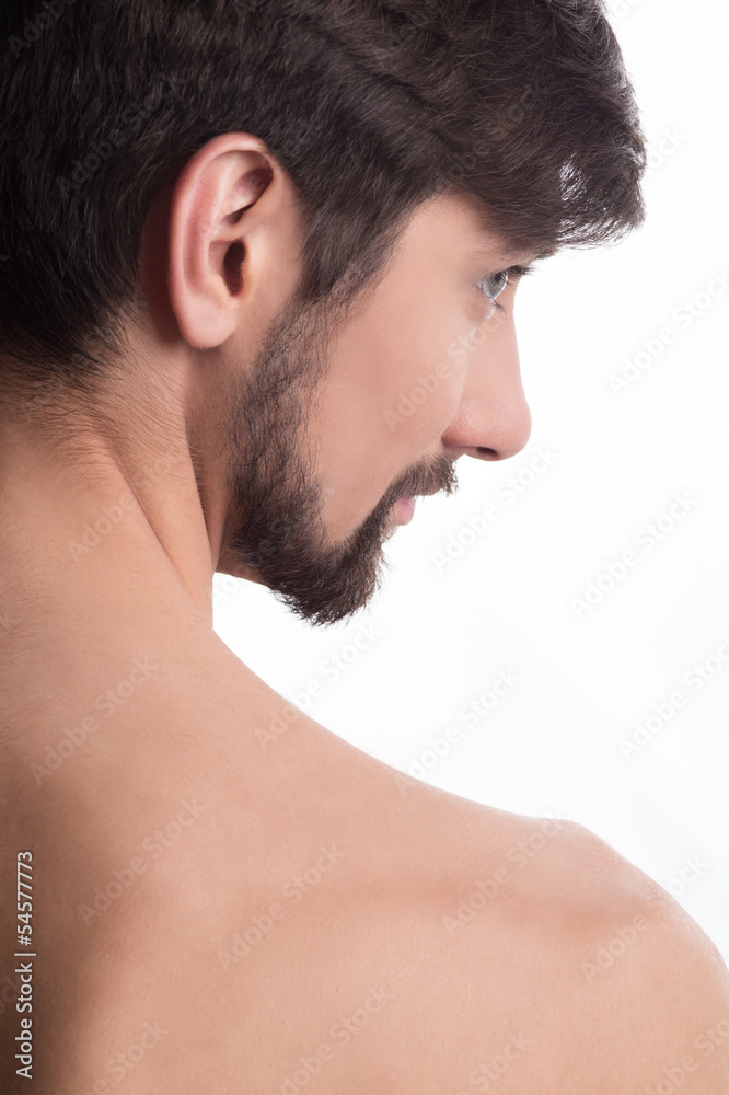 Obraz premium Guy looking away. Side profile of a handsome man looking away