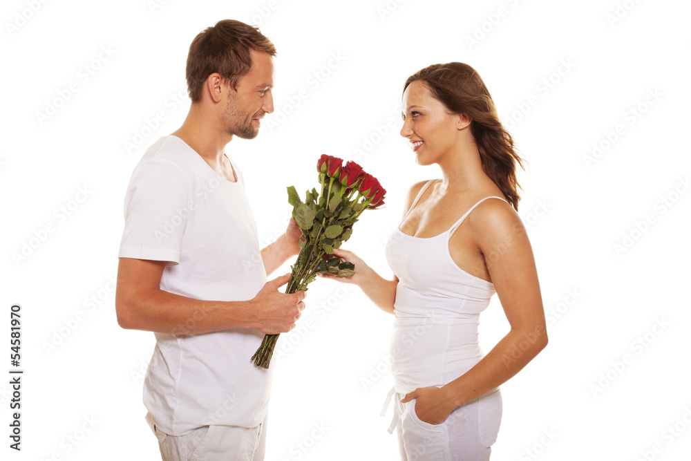 Husband offering a rose to his happy wife Husband offering a rose to his happy wife