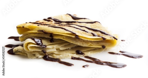 Sweet pancake with chocolate on white