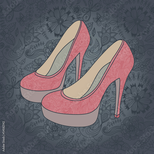 high-heeled vintage shoes with flowers fabric. (Texture behind t