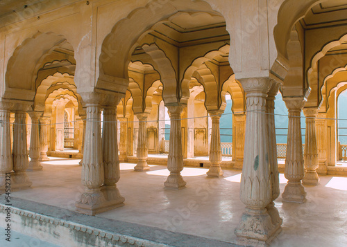 Gallery of rimmed pillars in light sunshine at Jaipur's Amber Fo
