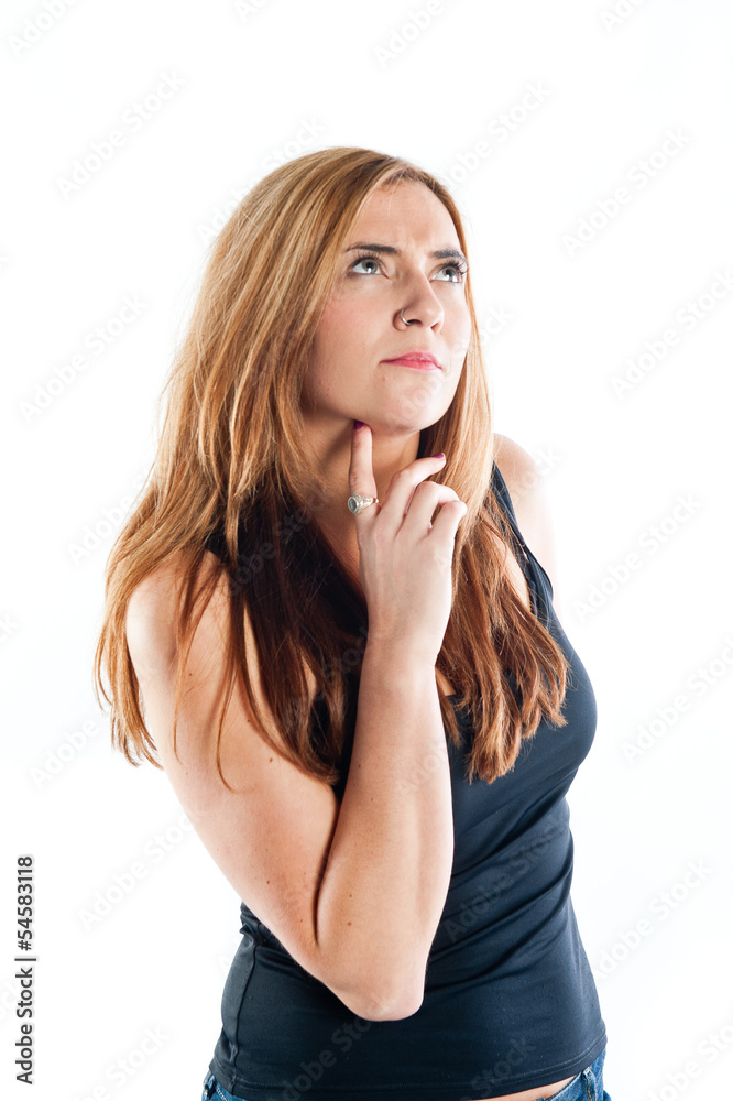 Beautiful young woman deep in thought Beautiful young woman deep in thought