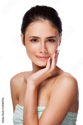 Beautiful face of young adult woman with clean skin