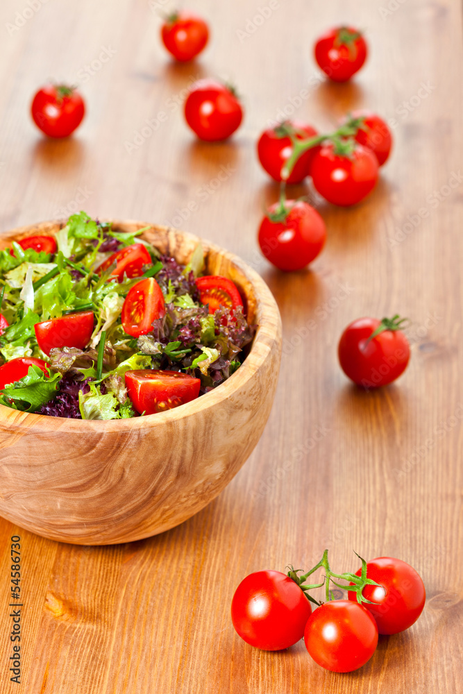 Mixed lettuce salad and tomatoes Mixed lettuce salad and tomatoes