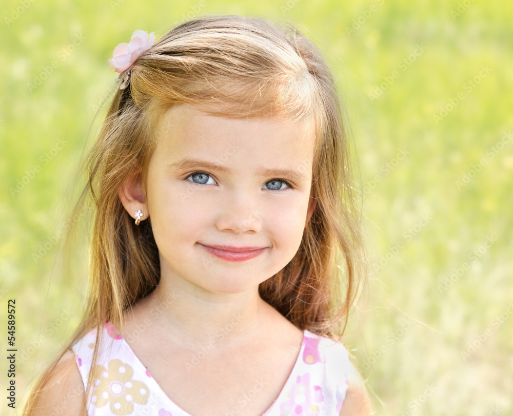 Outdoor portrait of adorable smiling little girl Outdoor portrait of adorable smiling little girl