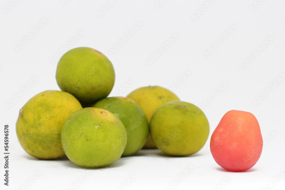 Lemon fruit with one Cherry tomatoes. Lemon fruit with one Cherry tomatoes.
