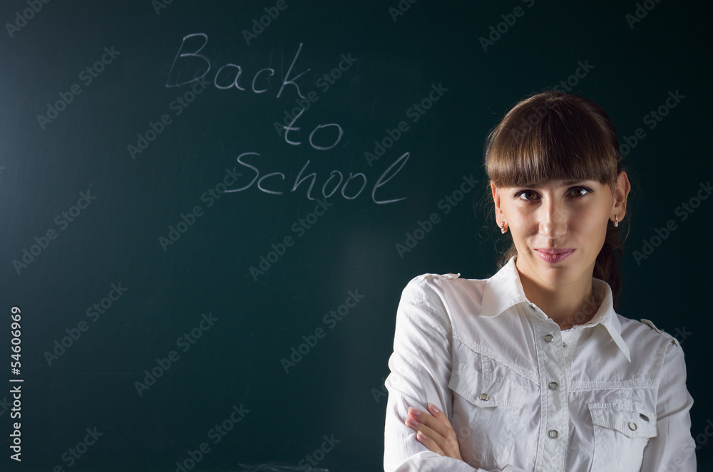 Young attractive Teacher awaiting for student in college Young attractive Teacher awaiting for student in college