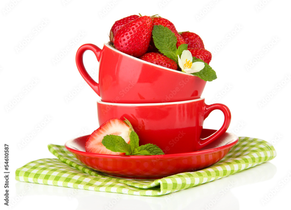 Ripe sweet strawberries in red cups, isolated on white Ripe sweet strawberries in red cups, isolated on white