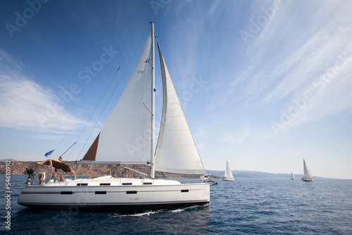 Sailing yachts race in Greece