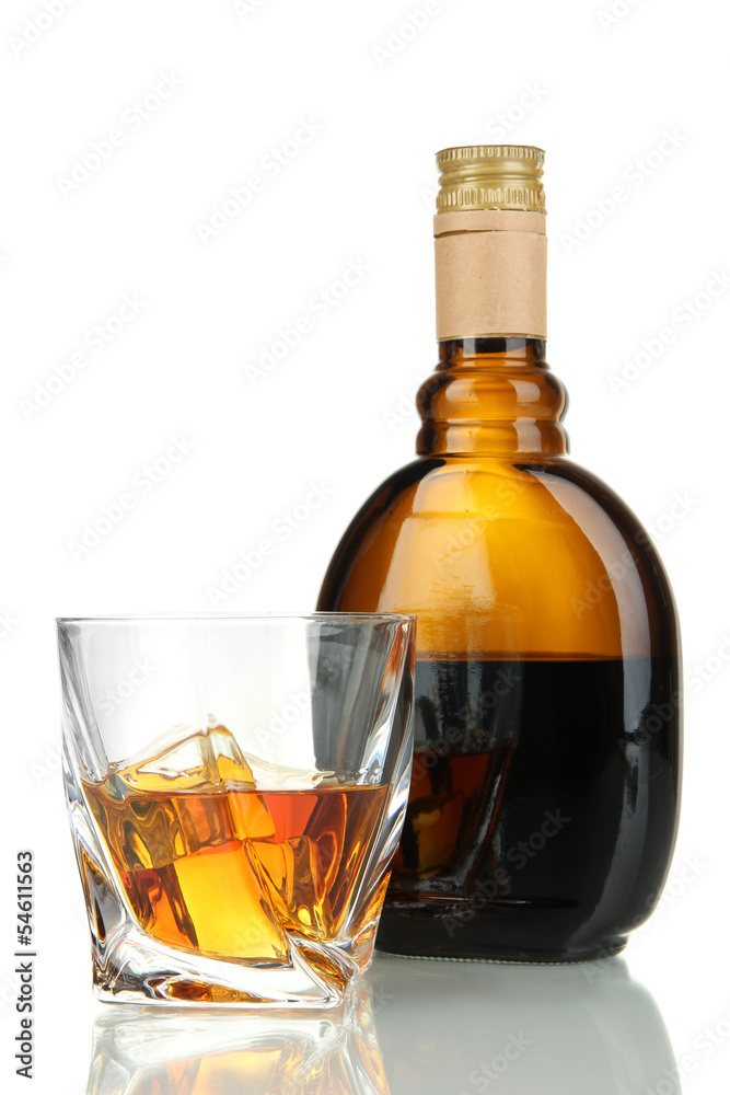 Glass of liquor with bottle, isolated on white Glass of liquor with bottle, isolated on white