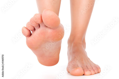 Foot stepping isolated on white © koszivu