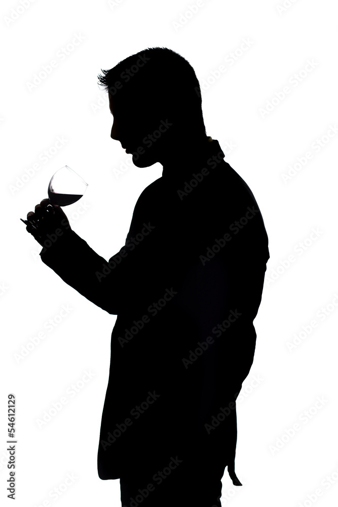 Man holding a red glass of fine wine