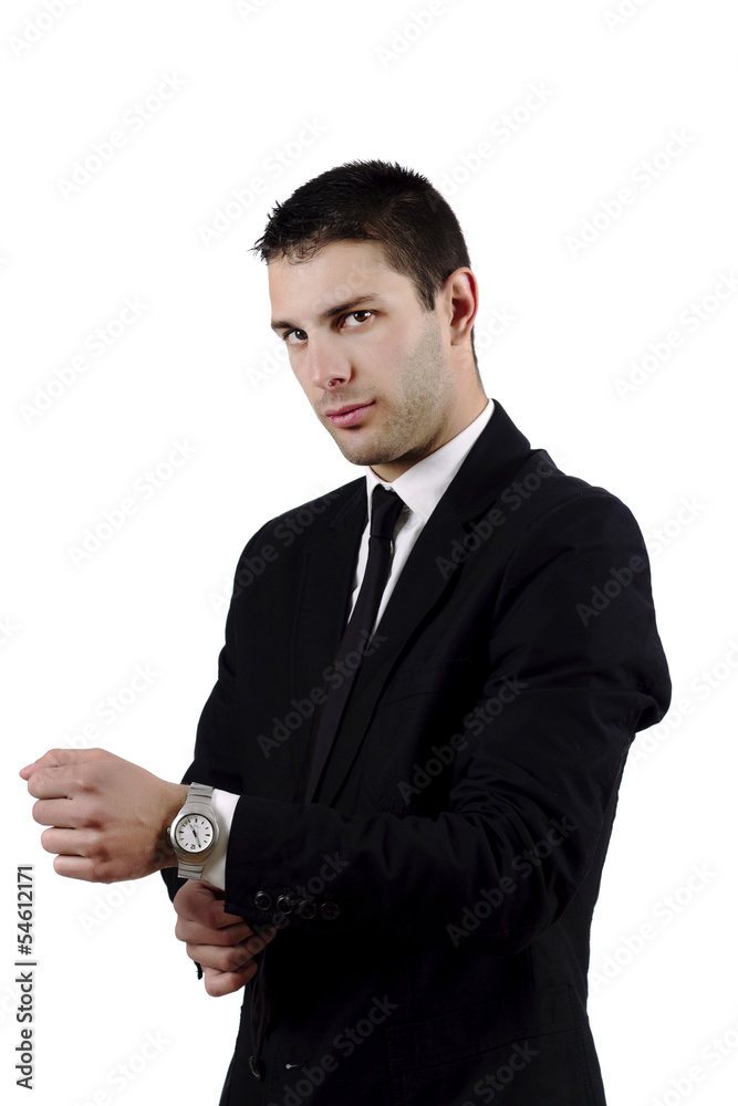 handsome man adjusting wrist buttons of suit