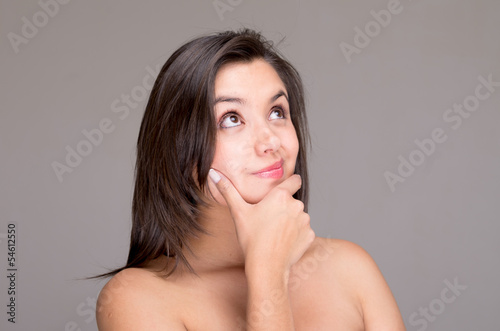 Thinking naked topless woman