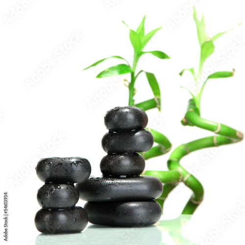 Spa stones and bamboo isolated on white