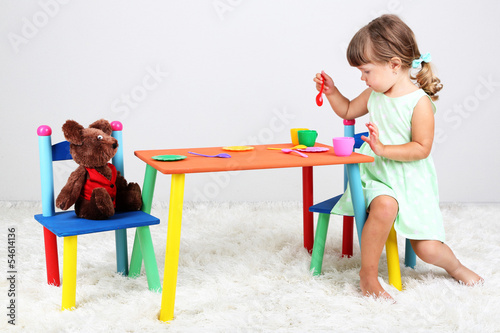 Little cute girl sitting