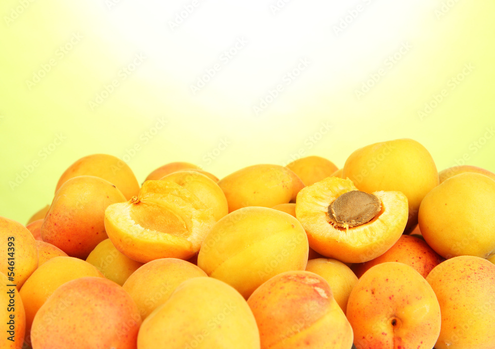 Fresh natural apricot on green background