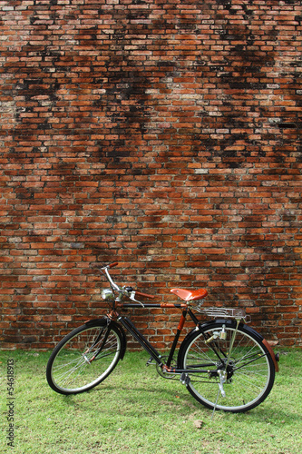 Vintage bicycle and red brick wall