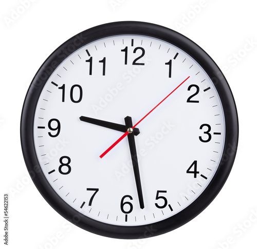 Office clock shows half past nine