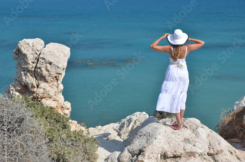 Girl looking to the sea near Aphrodite birthplace, Cyprus © HappyAlex