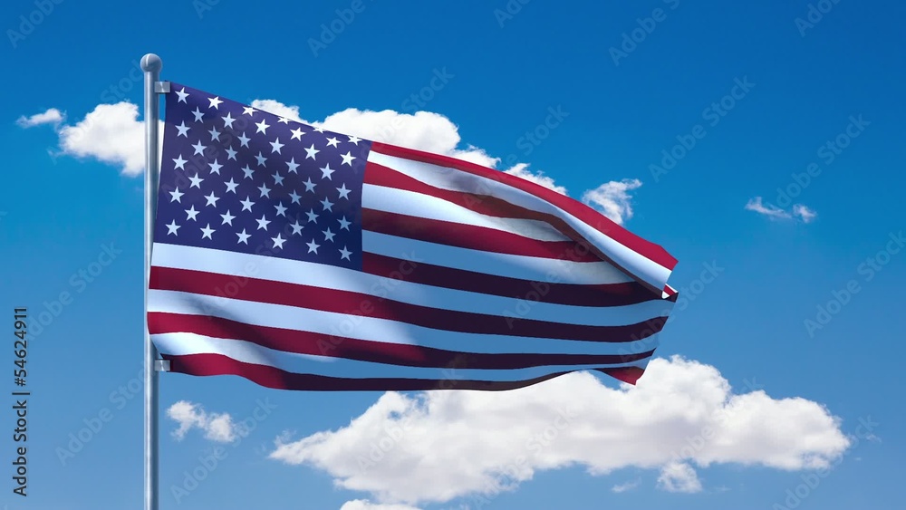 American flag stars and stripes waving over a blue cloudy sky