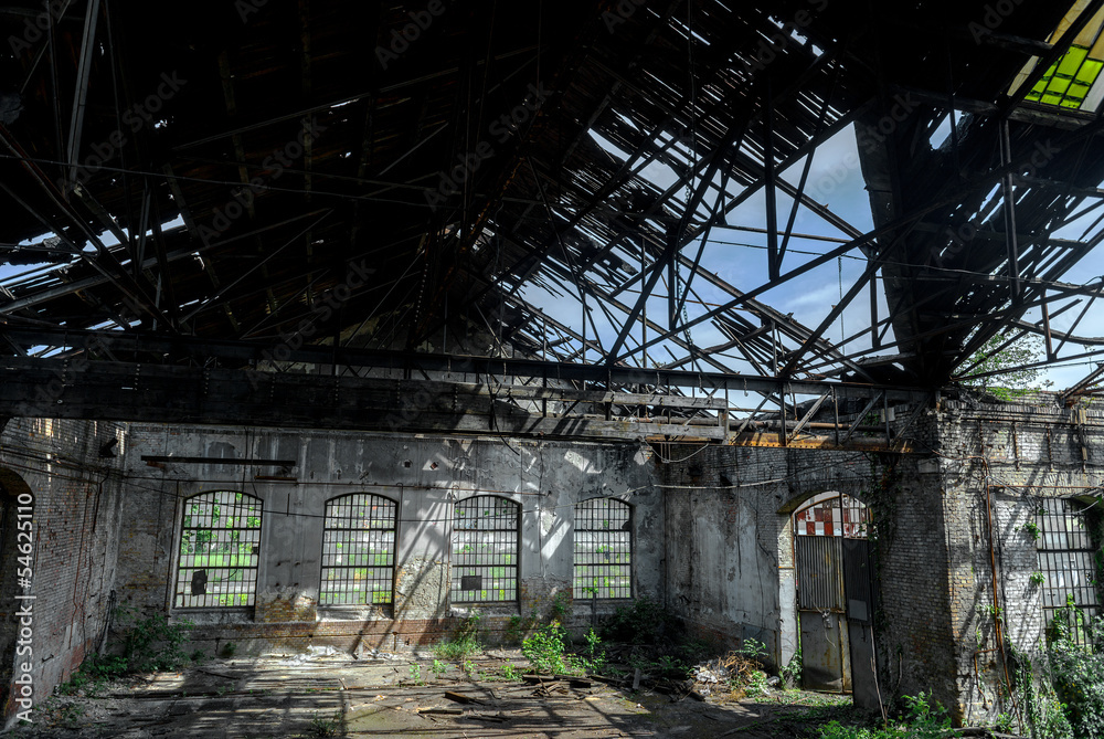 Abandoned industrial interior with bright light