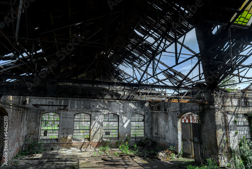 Abandoned industrial interior with bright light