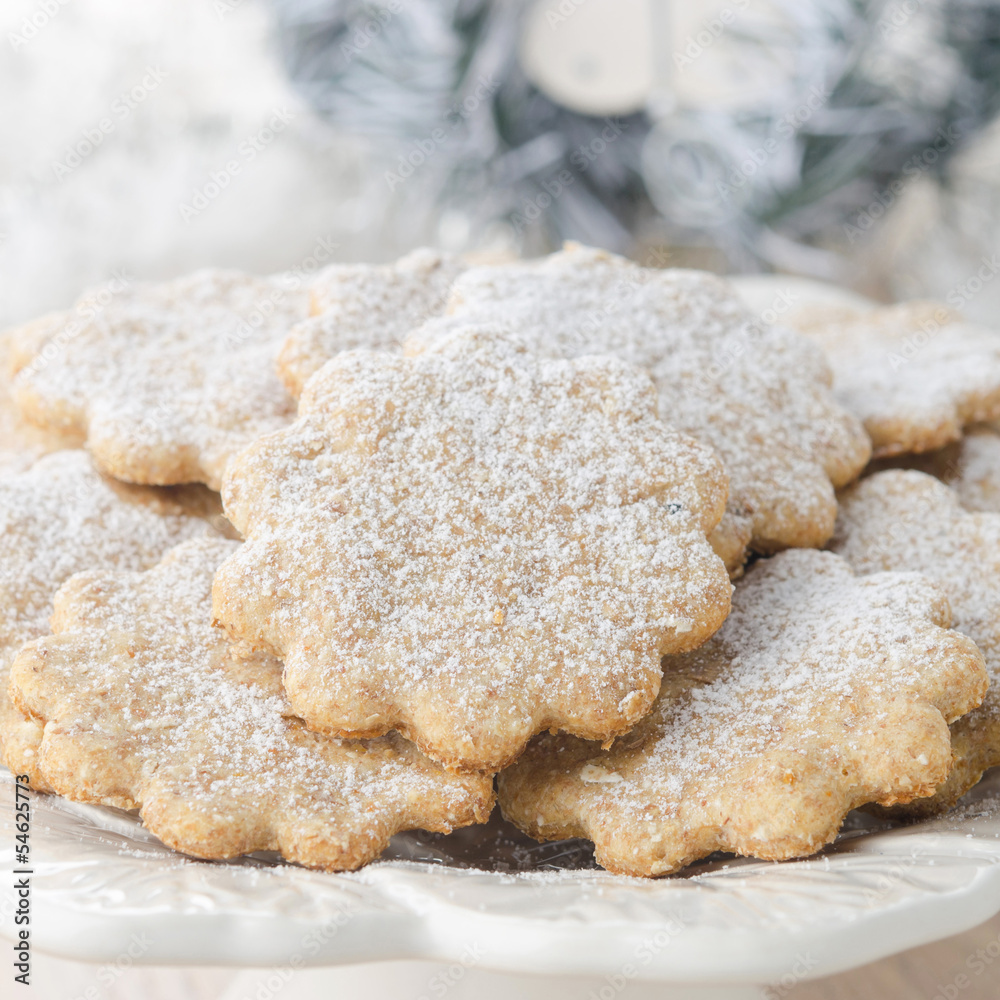 Christmas gingerbread cookies, sprinkled with powdered sugar