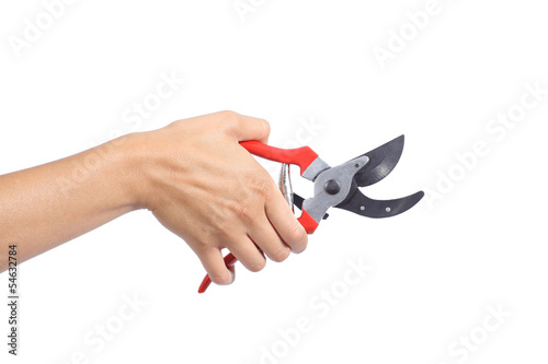 Woman hand holding an opened secateurs