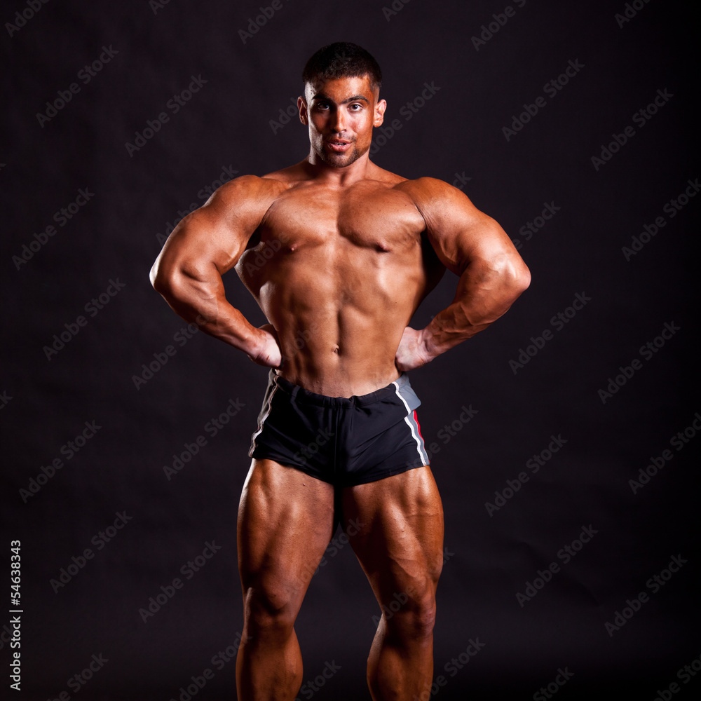 young bodybuilder posing young bodybuilder posing