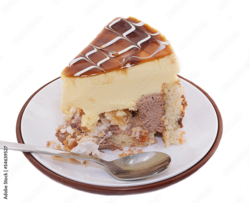 piece of delicious cake with mango mousse. isolated piece of delicious cake with mango mousse. isolated