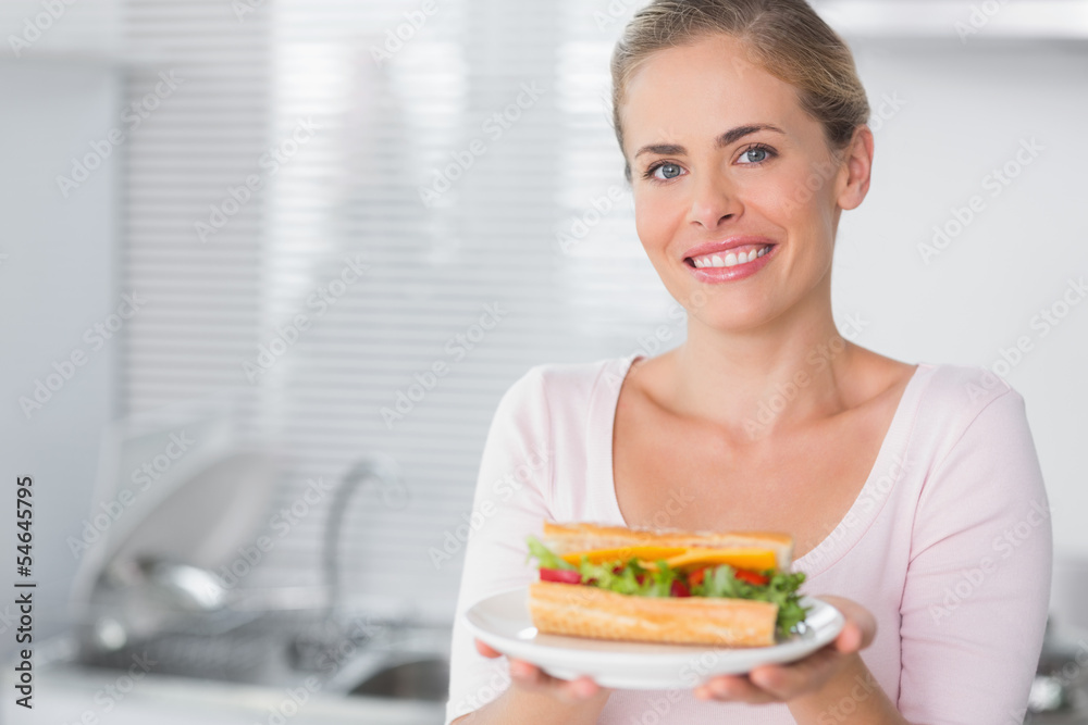 Happy woman holding sandwich Happy woman holding sandwich
