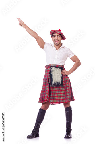 Funny scotsman dancing on white