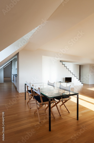 Interior, wide loft, hardwood floor, view dining table