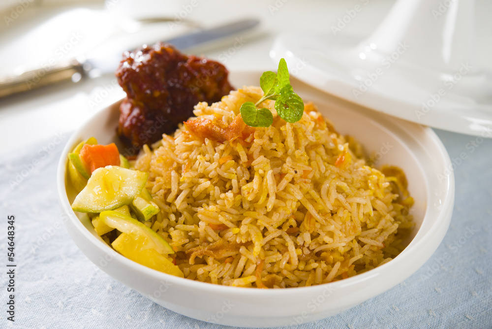 Biryani chicken rice cooked in arab style tajine with traditiona