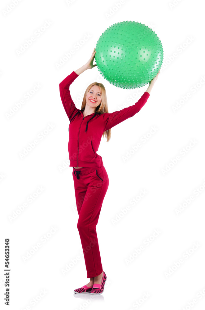 Young woman with ball exercising on white Young woman with ball exercising on white