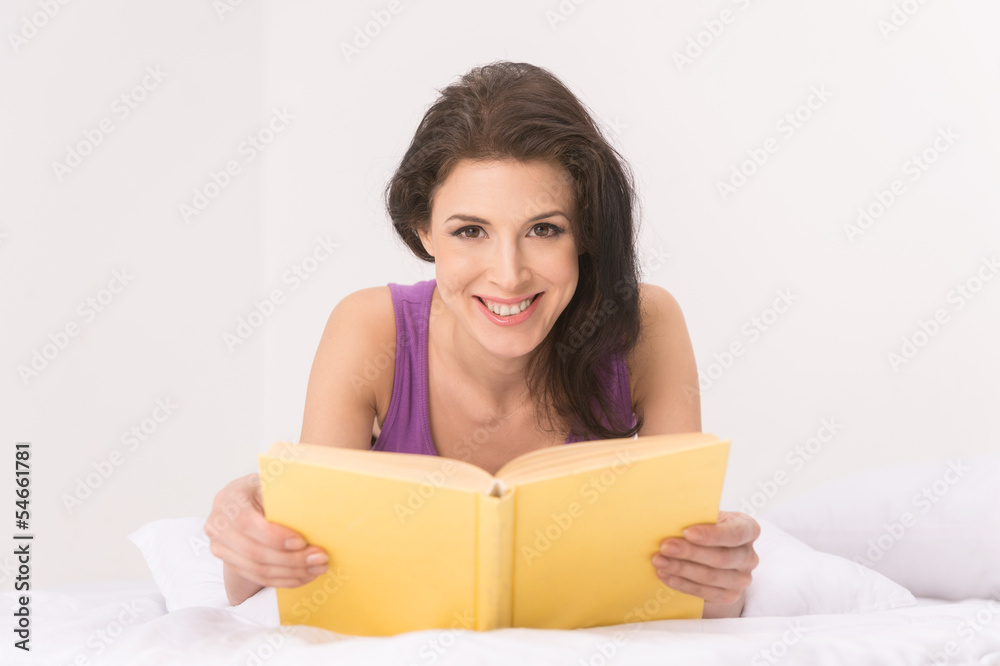 Women reading book. Beautiful middle-aged women reading a book a Women reading book. Beautiful middle-aged women reading a book a